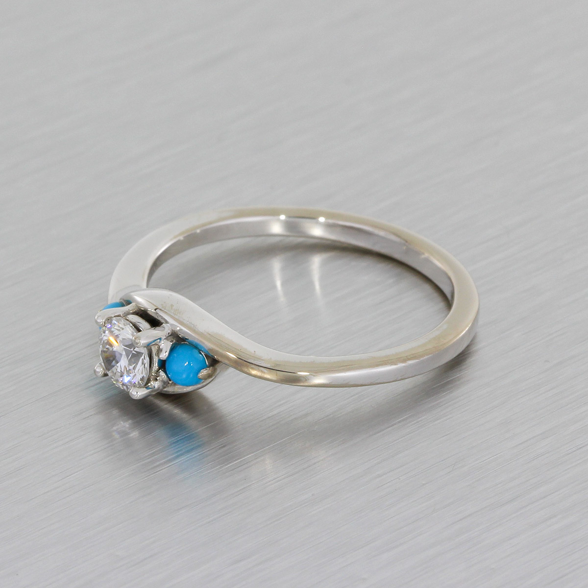 Diamond ring with 2025 turquoise side stones